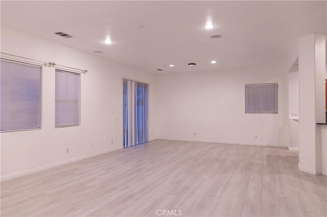 1594 Margit St, Redlands, CA 92374 - spare room with recessed lighting, visible vents, light wood-style flooring, and baseboards