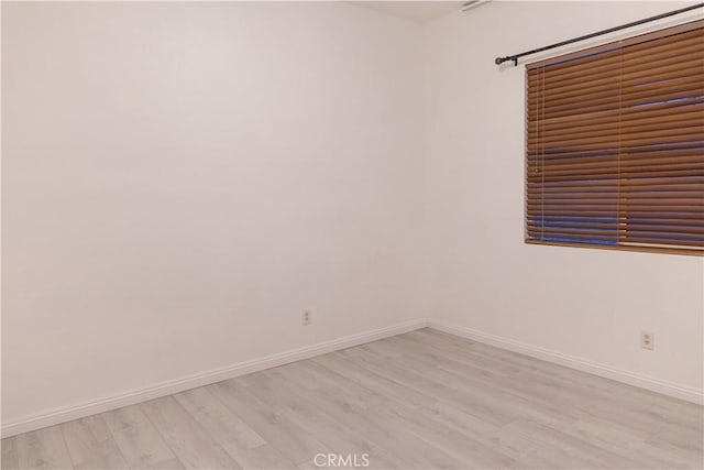 1594 Margit St, Redlands, CA 92374 - empty room featuring baseboards and light wood-style flooring