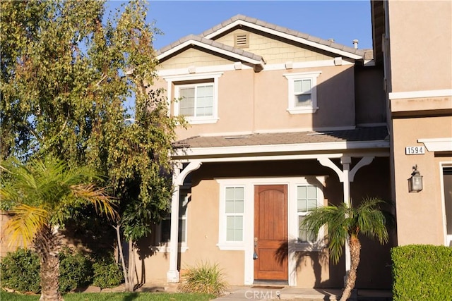 view of front facade with stucco siding