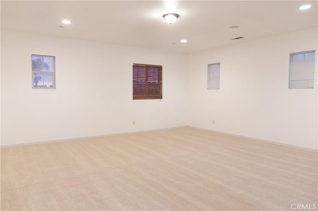 1594 Margit St, Redlands, CA 92374 - unfurnished room with light colored carpet, recessed lighting, and baseboards