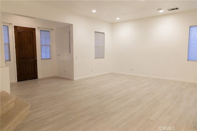 1594 Margit St, Redlands, CA 92374 - unfurnished room with baseboards, visible vents, and light wood-style floors