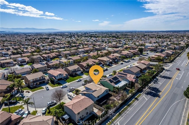 bird's eye view featuring a residential view and a mountain view