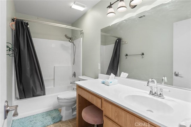 bathroom with tile patterned flooring, vanity, toilet, and shower / bath combo with shower curtain