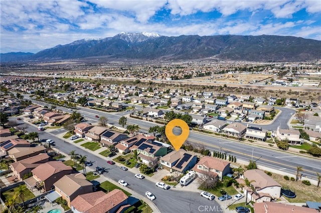 aerial view with a residential view and a mountain view