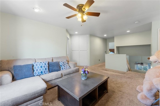 living area featuring ceiling fan, carpet flooring, and recessed lighting