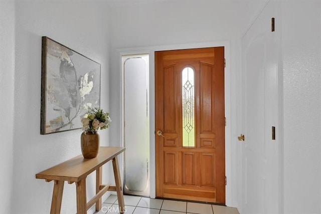 foyer with light tile patterned floors