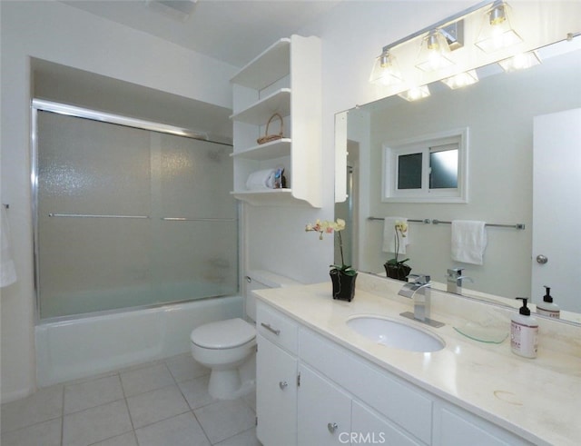 bathroom featuring toilet, tile patterned flooring, shower / bath combination, and vanity