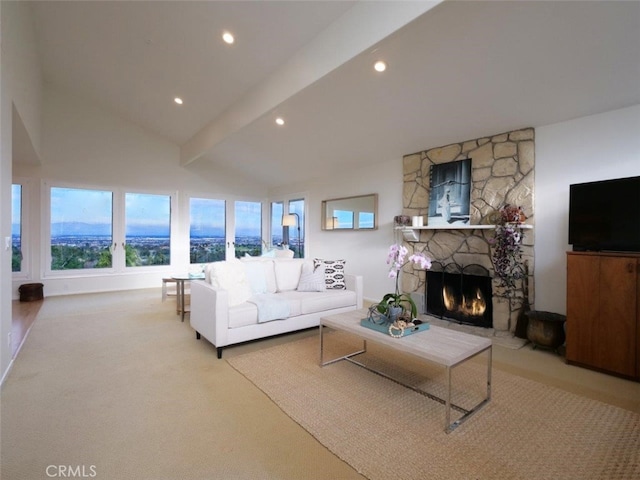 living area featuring vaulted ceiling with beams, a stone fireplace, recessed lighting, light carpet, and baseboards