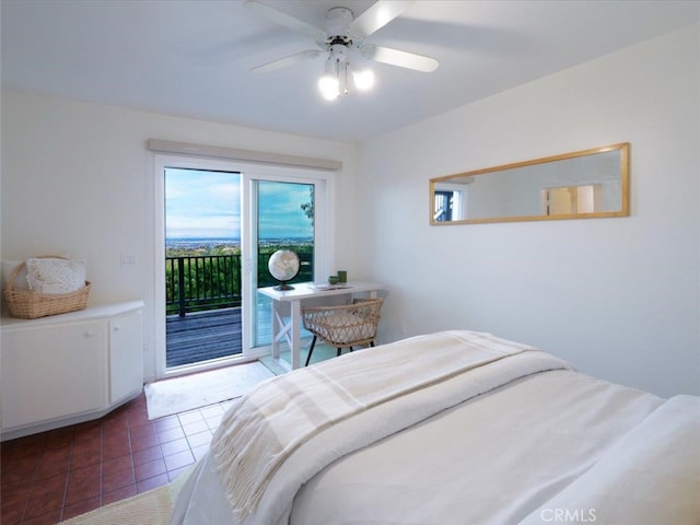 tiled bedroom with a ceiling fan and access to outside