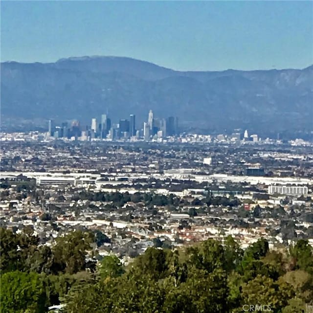 property view of mountains with a view of city
