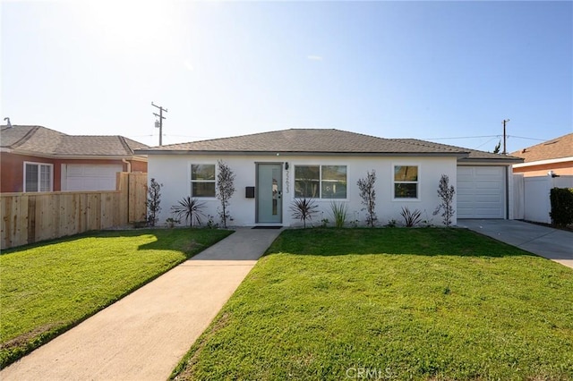 single story home featuring a garage, fence, concrete driveway, stucco siding, and a front lawn