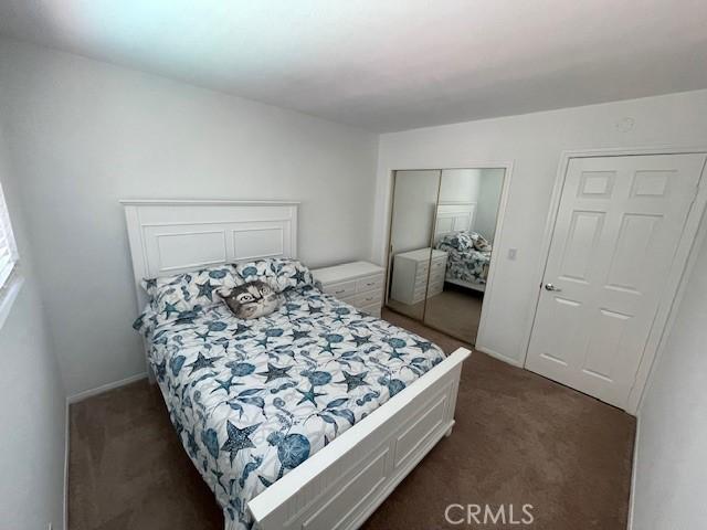 8373 Denise Ln, West Hills, CA 91304 - bedroom featuring dark carpet and a closet