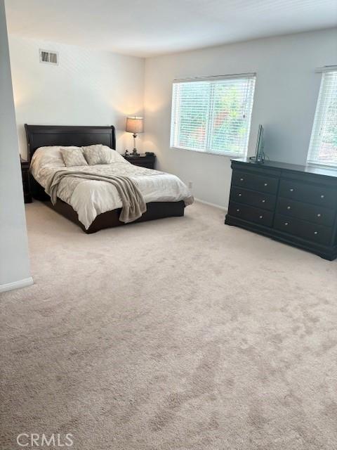 8373 Denise Ln, West Hills, CA 91304 - bedroom with multiple windows and carpet floors
