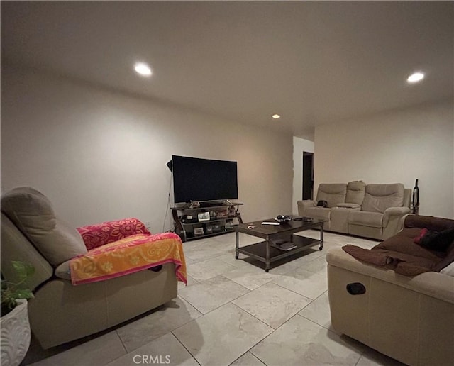 living room featuring recessed lighting