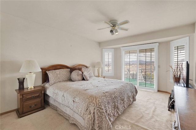 bedroom with light carpet, ceiling fan, baseboards, and access to exterior