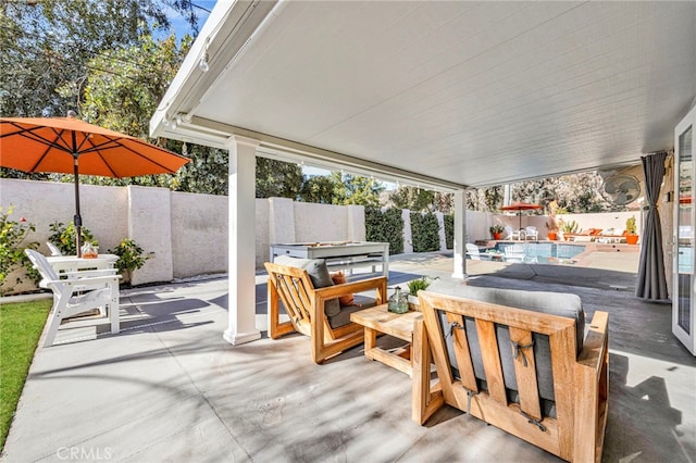 view of patio with a fenced in pool, a fenced backyard, and a jacuzzi