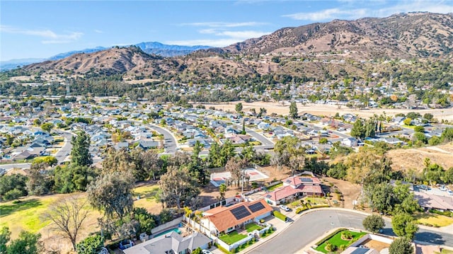 bird's eye view featuring a mountain view and a residential view