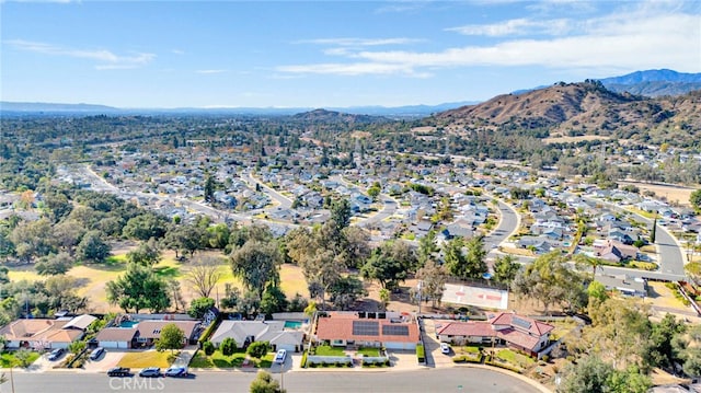 birds eye view of property featuring a residential view and a mountain view