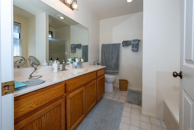 full bath with a shower with door, vanity, baseboards, tile patterned flooring, and toilet