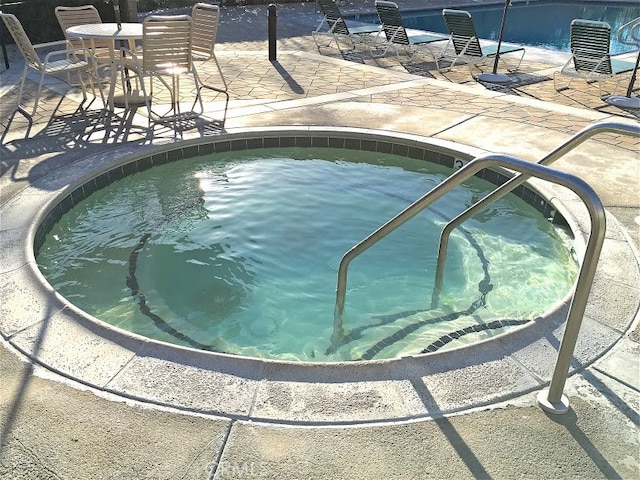 view of pool with a patio