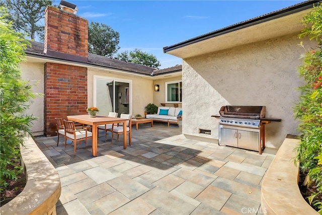view of patio / terrace featuring outdoor dining area, a grill, and an outdoor living space