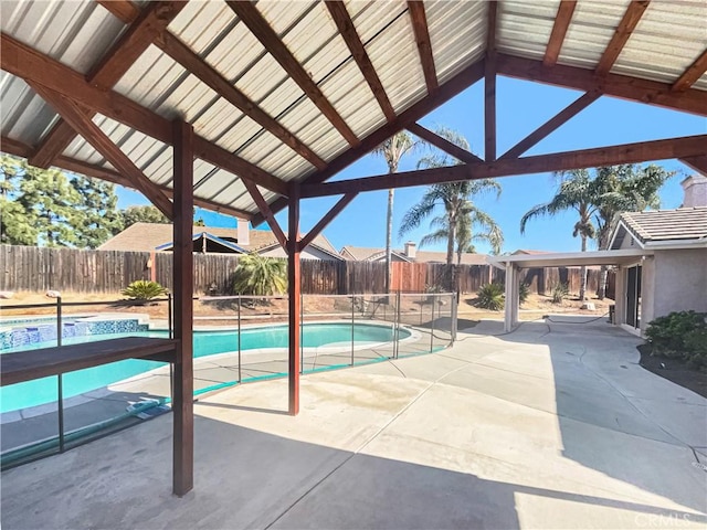 view of swimming pool with a patio area, a fenced backyard, and a fenced in pool