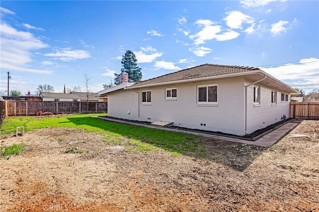 355 French St, Willows, CA 95988 - back of property with a yard and a fenced backyard