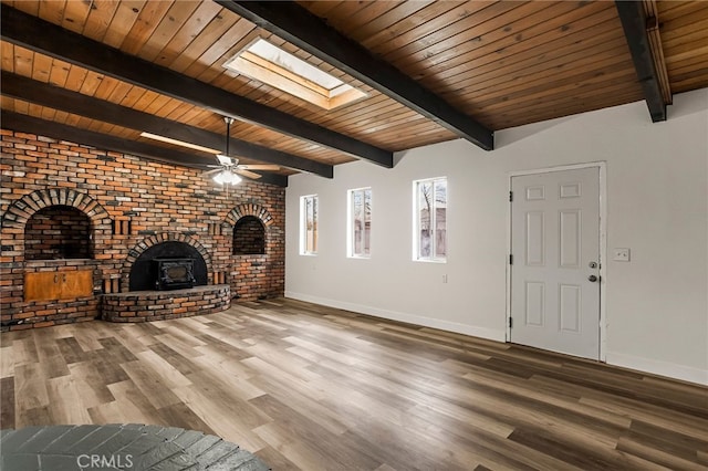 355 French St, Willows, CA 95988 - unfurnished living room with brick wall, wooden ceiling, baseboards, and wood finished floors