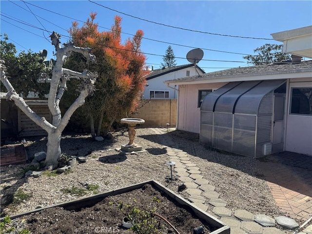 view of yard with fence