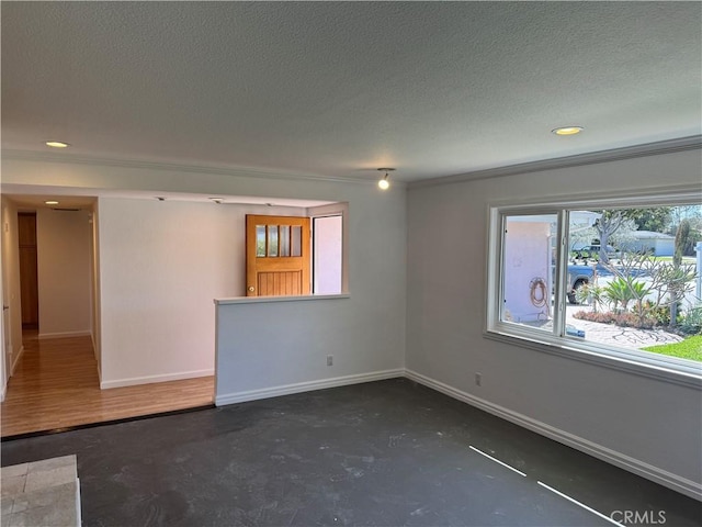 empty room with recessed lighting, a textured ceiling, baseboards, and unfinished concrete floors