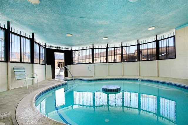 pool featuring a patio and fence