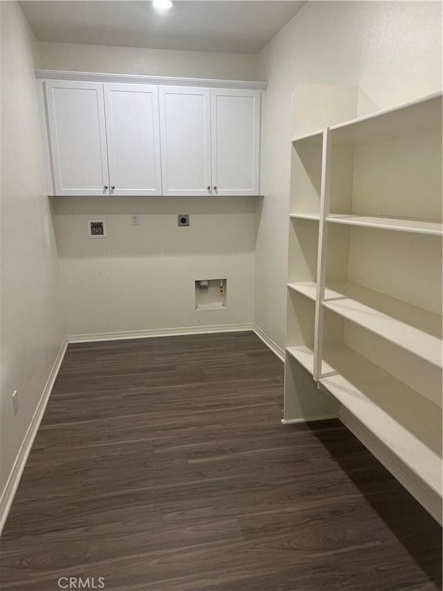 laundry area featuring dark wood-style floors, washer hookup, electric dryer hookup, and baseboards