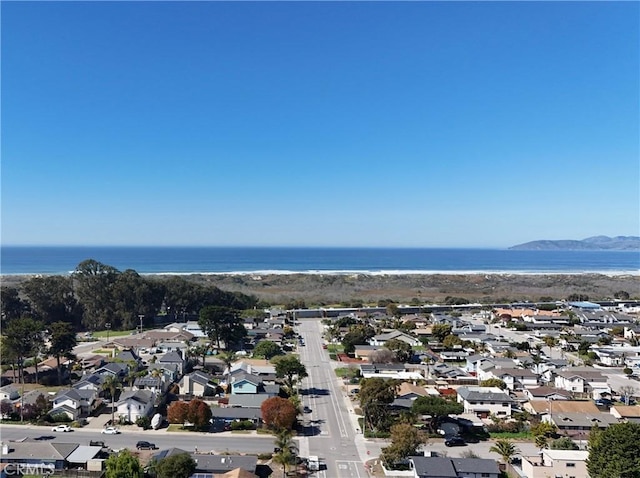 bird's eye view with a water view and a residential view