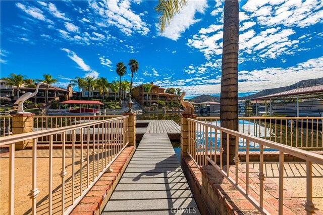 30220 Skippers Way Dr, Canyon Lake, CA 92587 - view of property's community with a boat dock and a water and mountain view