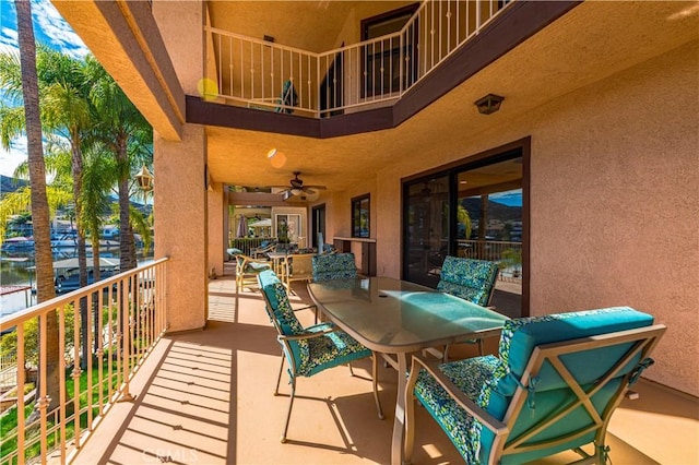 30220 Skippers Way Dr, Canyon Lake, CA 92587 - view of patio / terrace featuring a balcony, ceiling fan, and outdoor dining space