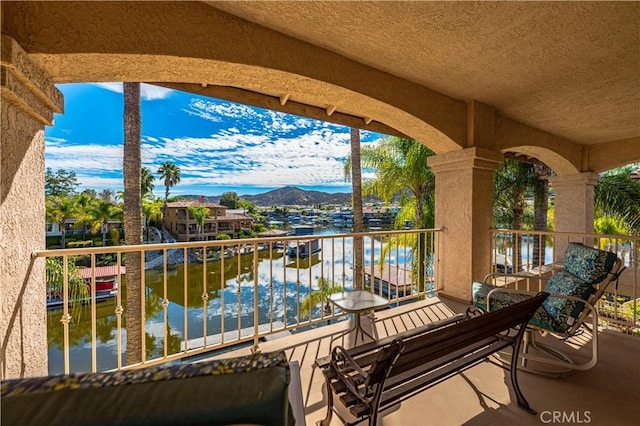 30220 Skippers Way Dr, Canyon Lake, CA 92587 - view of patio featuring a balcony and a water and mountain view