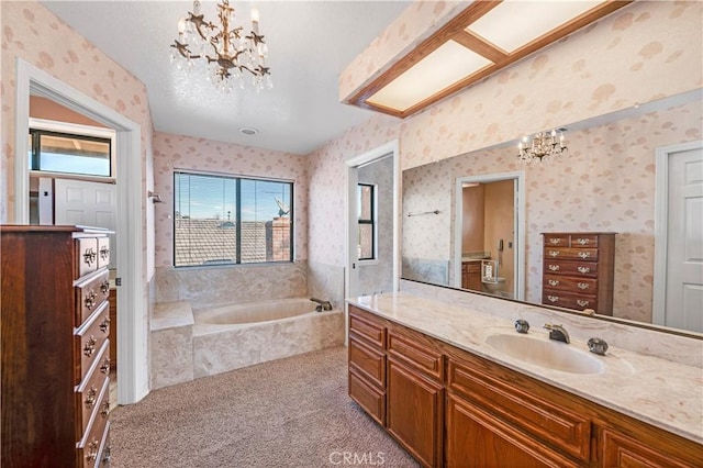 30220 Skippers Way Dr, Canyon Lake, CA 92587 - bathroom with a notable chandelier, vanity, a bath, and wallpapered walls