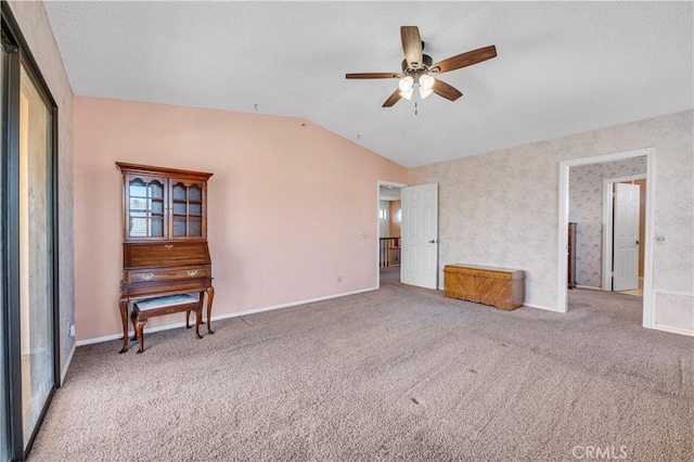 30220 Skippers Way Dr, Canyon Lake, CA 92587 - carpeted empty room with baseboards, vaulted ceiling, and a ceiling fan