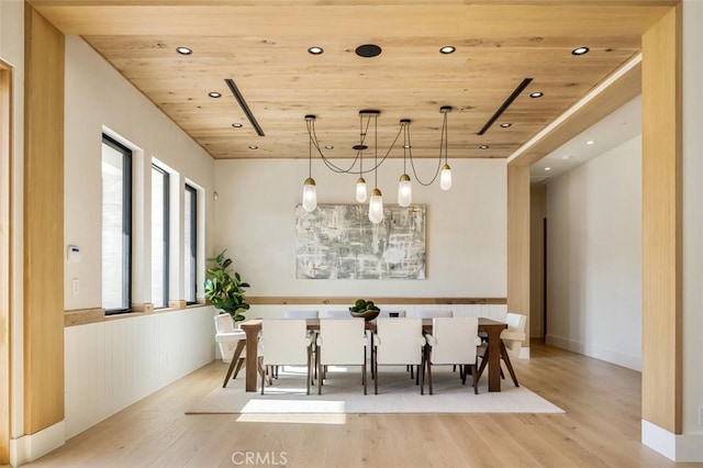 unfurnished dining area with wooden ceiling, light wood finished floors, and recessed lighting