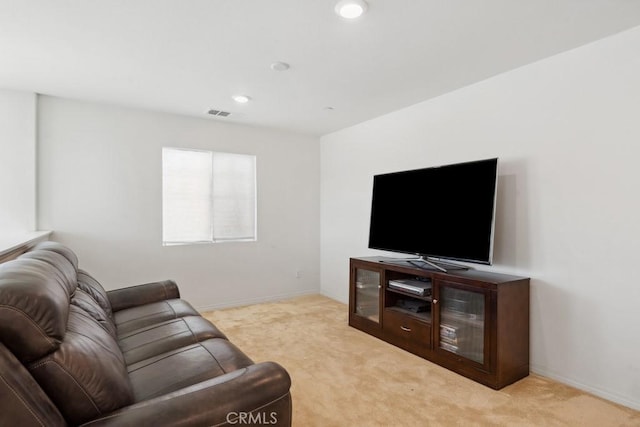 living room featuring light carpet, baseboards, visible vents, and recessed lighting