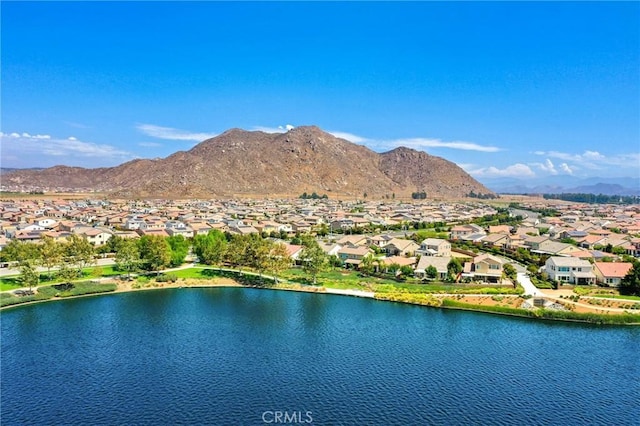 bird's eye view featuring a residential view and a water and mountain view