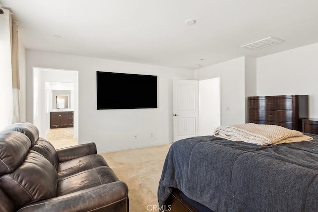 bedroom with light colored carpet, visible vents, and baseboards