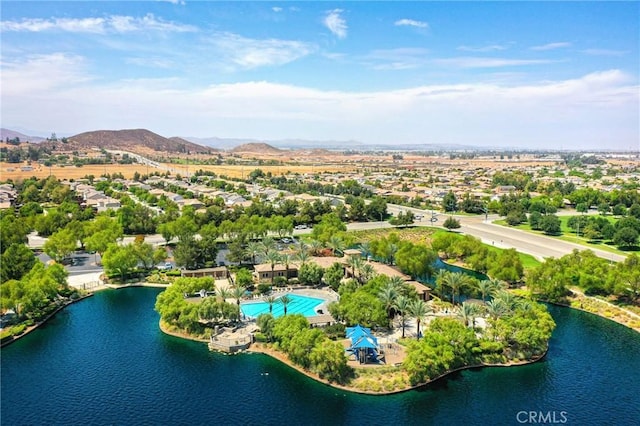 bird's eye view featuring a water and mountain view