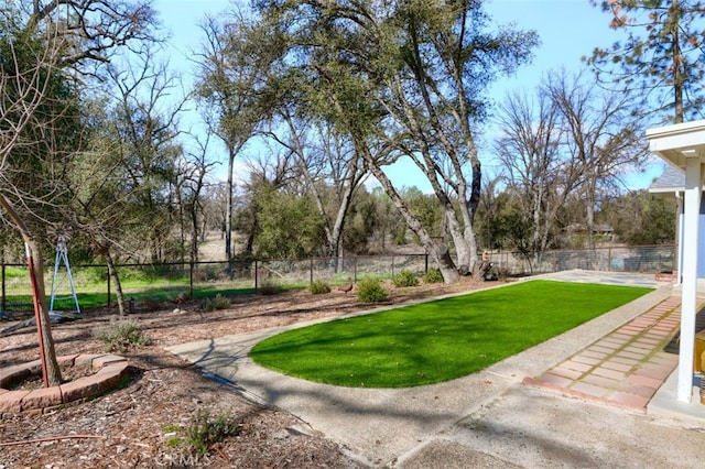 view of yard featuring a fenced backyard and a patio