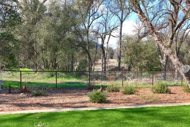 surrounding community featuring fence