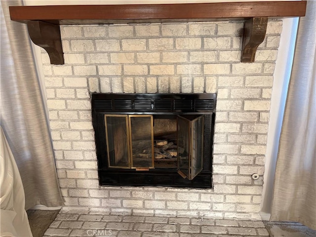 room details with a brick fireplace