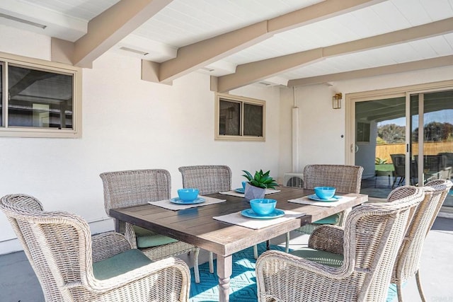 view of patio featuring outdoor dining area