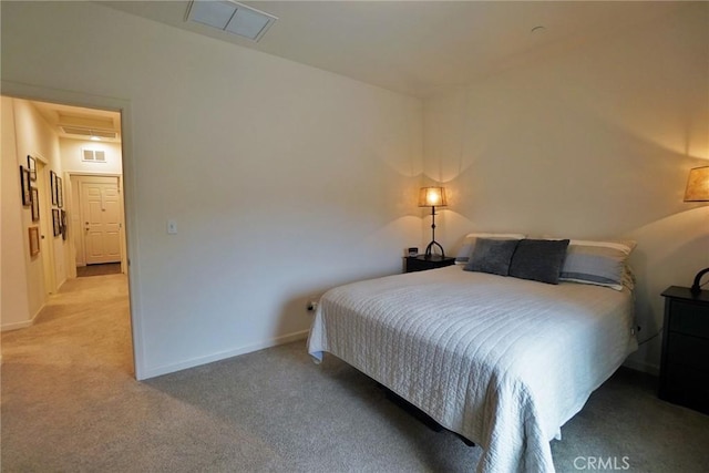 bedroom featuring light carpet, visible vents, and baseboards