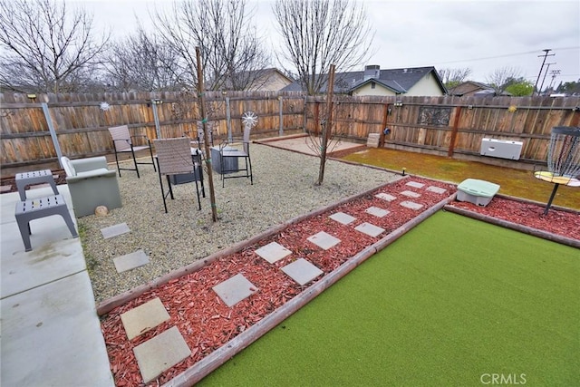 exterior space featuring a fenced backyard