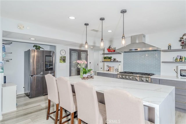 kitchen featuring open shelves, tasteful backsplash, visible vents, smart refrigerator, and wall chimney range hood